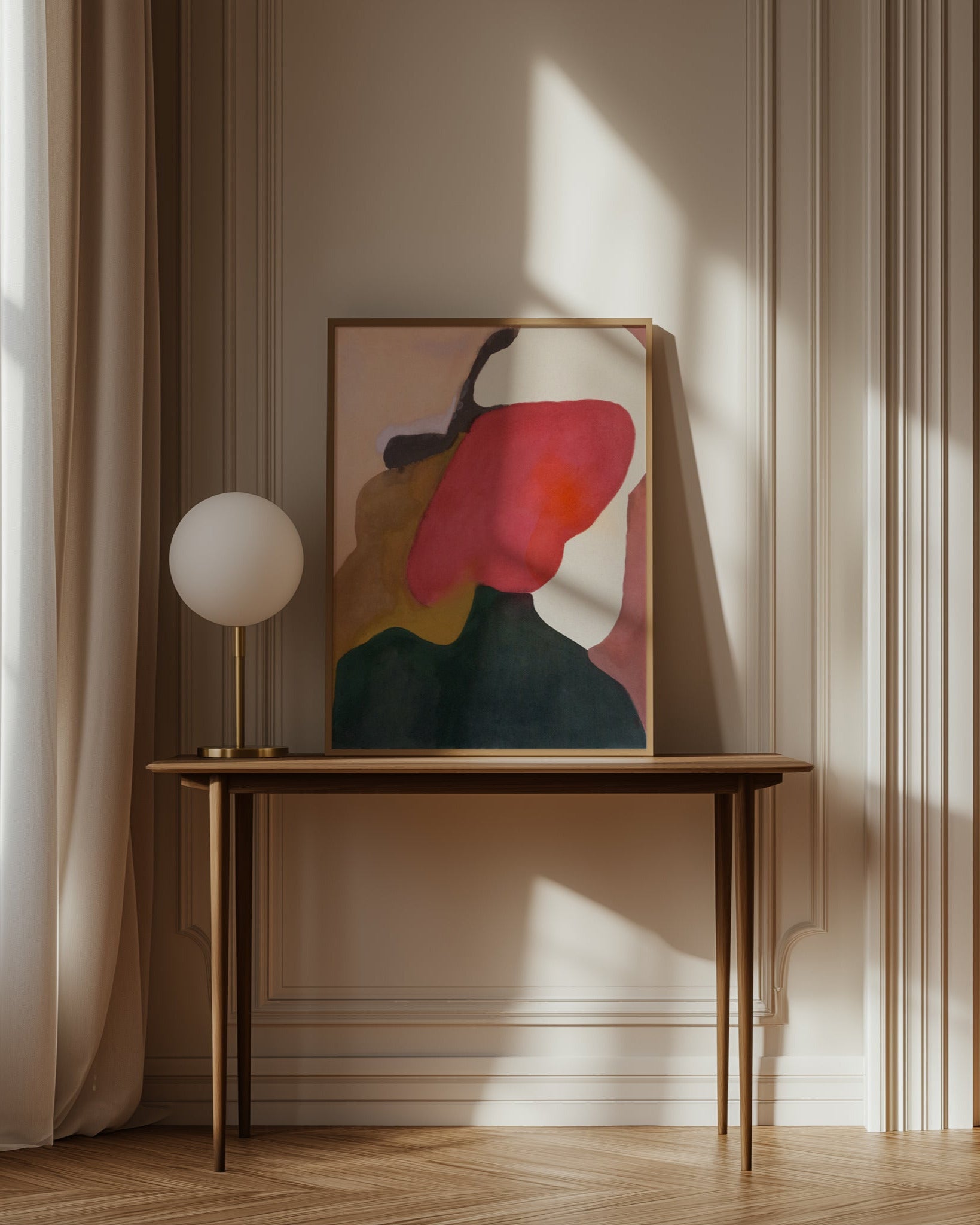 Abstract painting on a wooden table in a sophisticated room with wall molding.