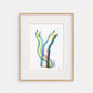 Framed colorful abstract artwork on a white background