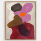 Framed abstract art piece with colorful shapes.