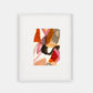 Framed abstract art with colorful geometric shapes on a white background