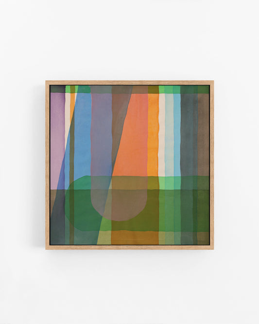 Framed abstract art with colorful geometric design on a white background