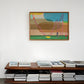 Modern interior with a wooden bookcase and a colorful abstract painting on the wall.