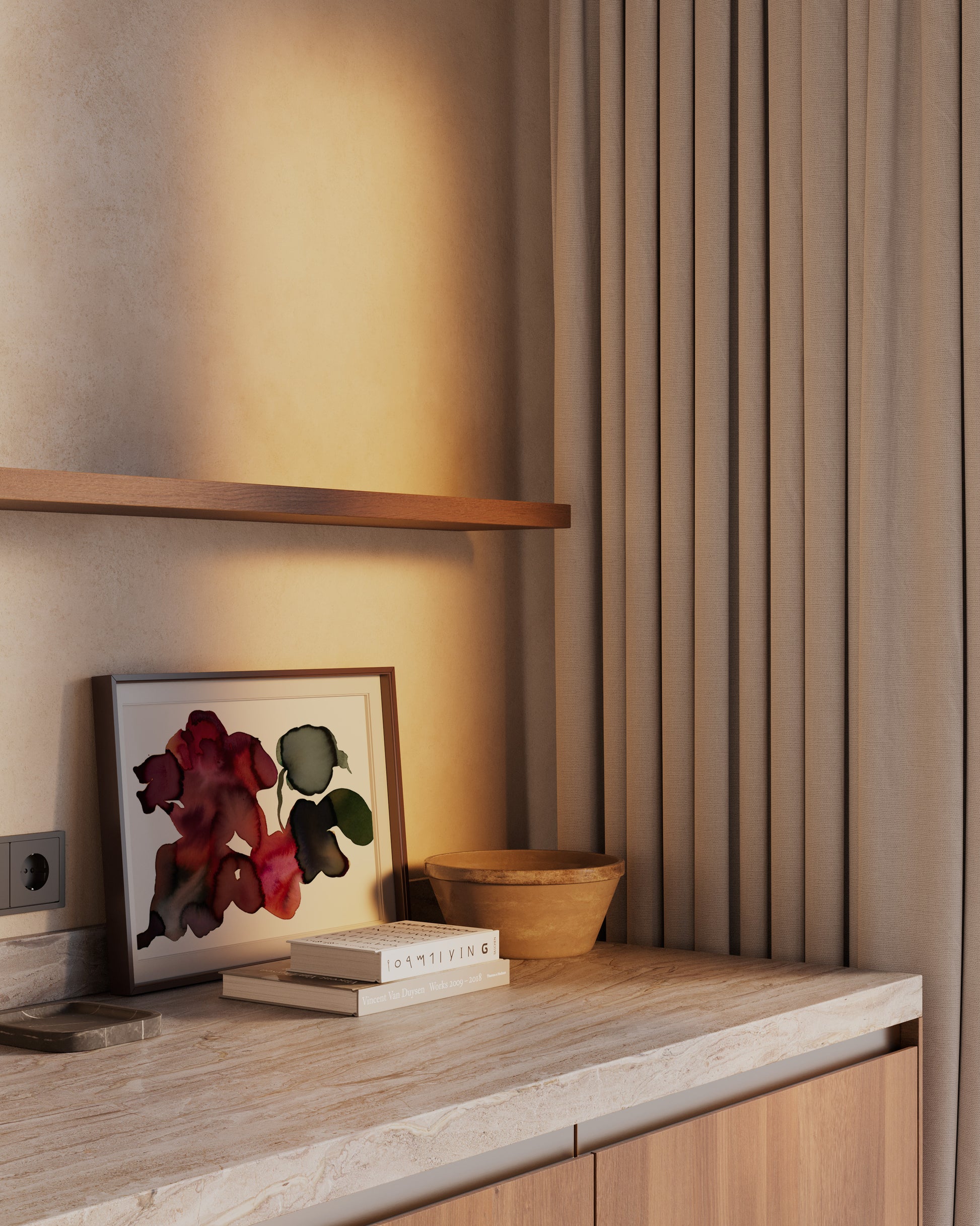 Abstract floral artwork leaning against a neutral wall.