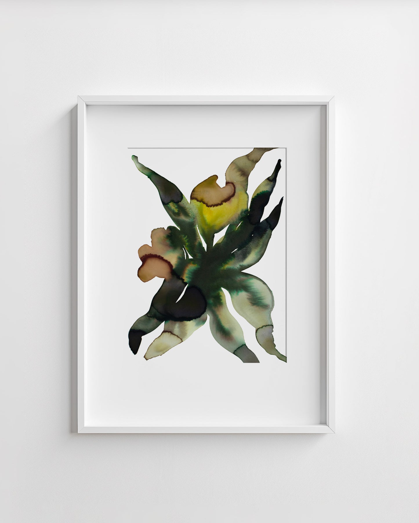 Framed artwork of a abstract flower on a white wall.