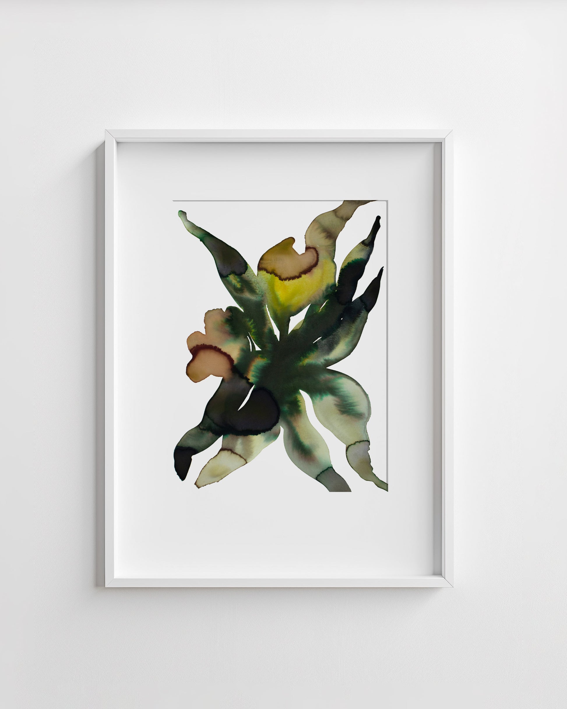 Framed artwork of a abstract flower on a white wall.