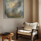 Wooden armchair in a room with abstract painting on wall