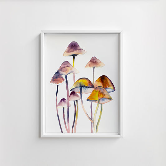 Framed artwork of watercolor mushrooms on a white wall