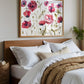 Bedroom with floral painting above the bed
